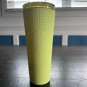 Used textured bright yellow Starbucks tumbler